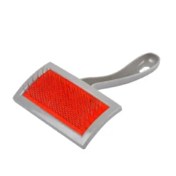 BROSSE PLASTIQUE ET INOX INCURVE CHIEN