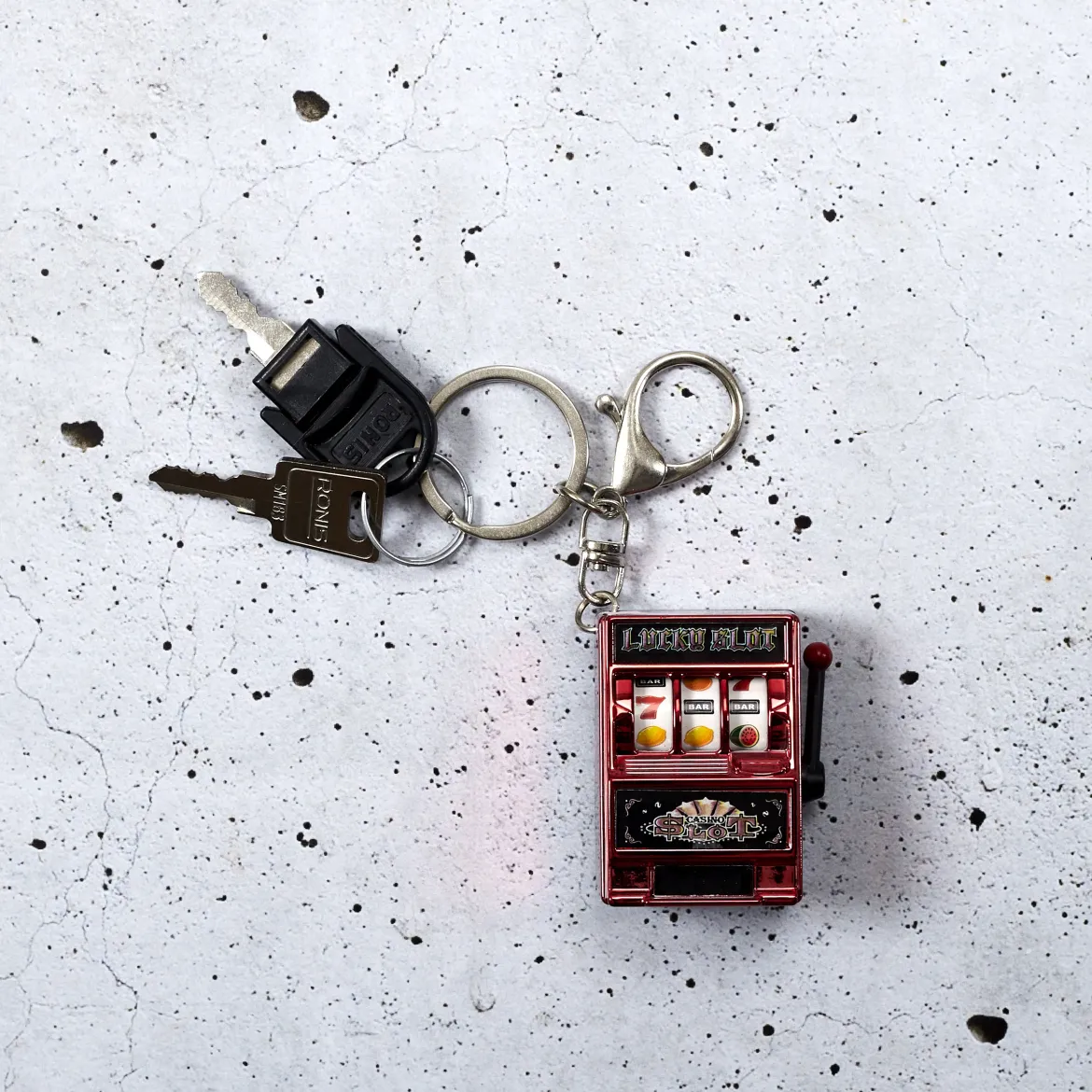 PORTE CLES MACHINE A SOUS